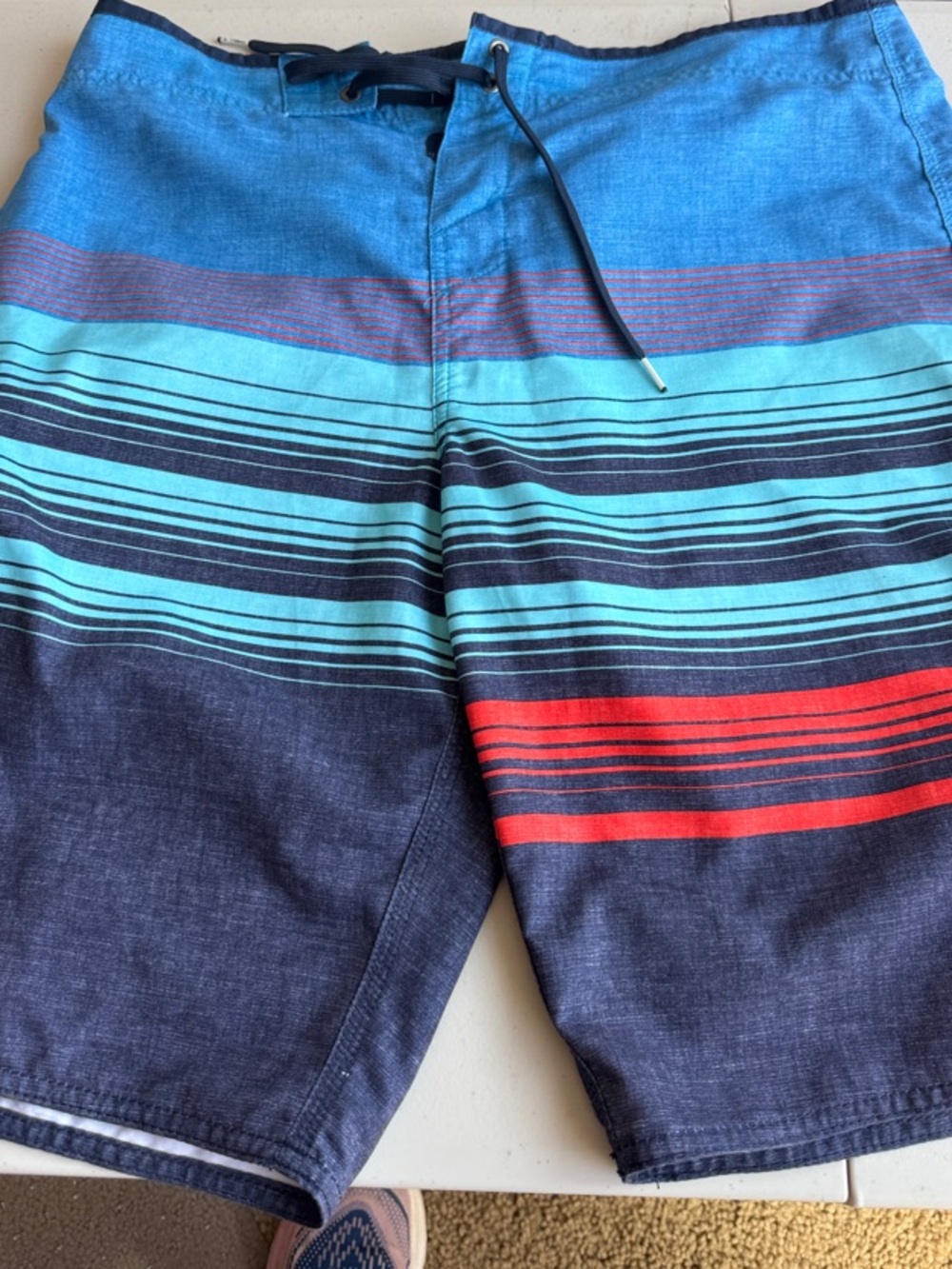O'Neill Blue Swim Board Shorts with Multi-color Stripe Accents
